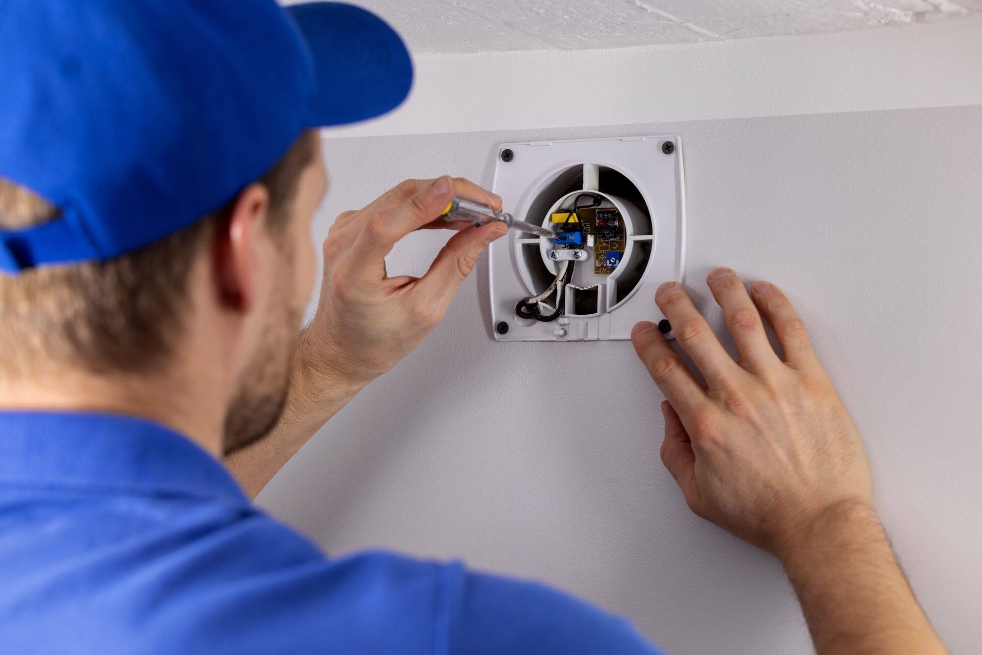 Bathroom exhaust repair on a commercial restroom ventilation system
